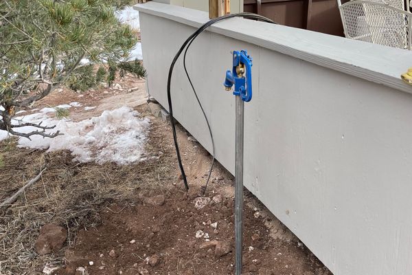 Linefeed for house and water tap for garden